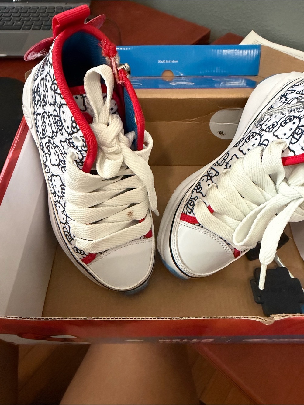 Heelys White High-Top Sneakers with Red Trim and Black Pattern